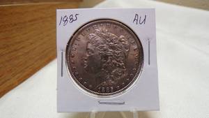 lot 7158 image: 1885  MORGAN SILVER DOLLAR - AU