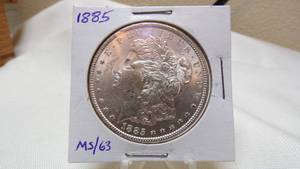 lot 7159 image: 1885  MORGAN SILVER DOLLAR - MS63