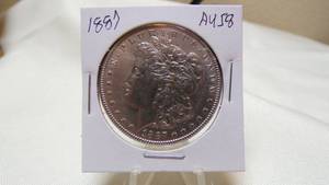 lot 7164 image: 1887  MORGAN SILVER DOLLAR - AU58