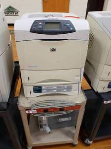 lot 3155 image: HP Laserjet 4250tn and HP LaserJet 2420dn on Black Rolling Cart