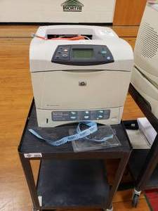 lot 3158 image: HP Laserjet 4200tn on Black Rolling Cart