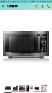 lot 1912 image: Toshiba Em131a5c-ss Microwave Oven With Smart Sensor, 1.2 Cu.ft, Stainless Steel