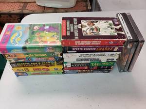 lot 9419 image: 13 Misc Vhs Tapes and 3 Dvds