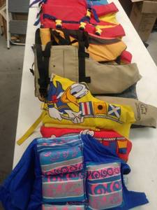 lot 8038 image: Life Jackets 7 ( 5 Adult 2 Child)