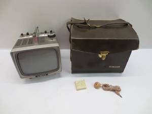 lot 1190 image: Vintage Singer Transistor Television Model TV6, With Carrying Case, Earbud, and Spare Fuses