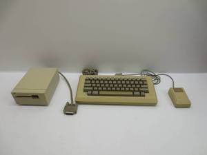 lot 1193 image: Vintage Apple Keyboard, Mouse, and External Floppy Drive