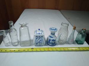 lot 37 image: Saki bottle and vases