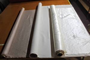 lot 6240 image: (3) Rolls of Decorative Fabric, Sheen Ivory, Textured White and Golden Tan