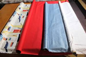 lot 6245 image: (4) Rolls of Coordinating Fabrics, Sailboat TPSA, and 3 Solids with sheen