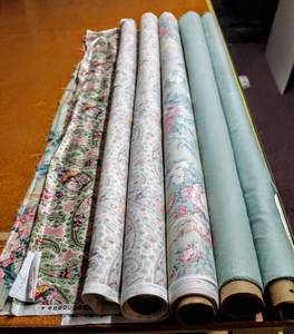 lot 6217 image: Lot of (5) Gorgeous Fabric Rolls including Kaufmann Fabrics, Cyrus Clark Co. Fabrics and others 56 Rolls and 48 Beautiful Sheens, Mints, Pinks, Paisley and Floral