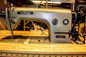 lot 6211 image: Vintage Commercial Brother High Speed Straight StitchLock Stitch Machine DB2-B714-3 with 121H Industrial Clutch Motor Table and Accessories included