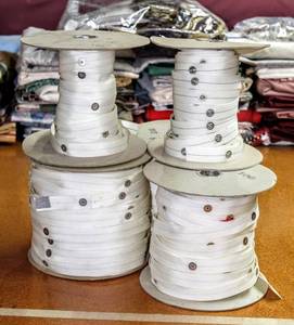 lot 6260 image: This Lot Contains Drapery Snap Tapes, New and used Rolls