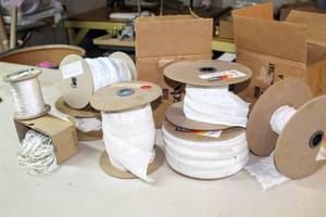 lot 6263 image: This Lot Contains Several New and Used Rolls of Cord Shirring, 3 Hobbled Shade Tape White, Diamond Braided Nylon