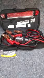 lot 117 image: Firestone Emergency Car Kit - Jumper Cables, Flashlight, Reflectors, and More