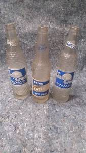 lot 518 image: Three Vintage Soda Bottles - Two Sun Crest, One Barqs