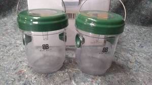 lot 540 image: Pair of Bee Bait Bottle Traps
