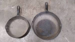 lot 672 image: Two Vintage Cast Iron Skillets