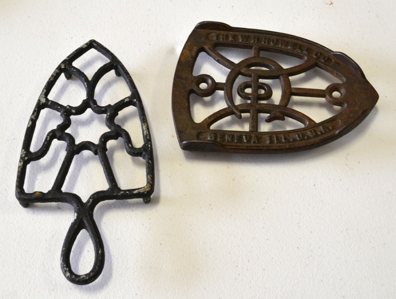 lot 2002 image: 2 Antique Iron RestsTrivets