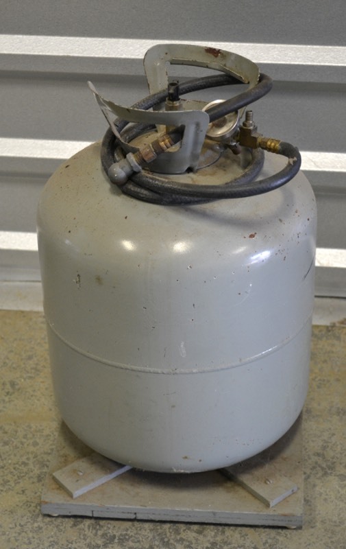 lot 2064 image: Tank with hose and guage mounted on wood