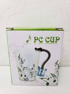 lot 22014 image: Musical Instrument Coffee Mug
