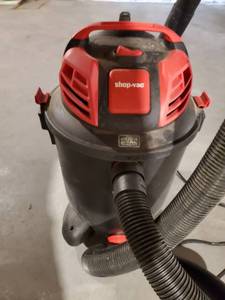 lot 3933 image: Red and Black 14 Gallon Shop Vac.With Wheels and Attachments