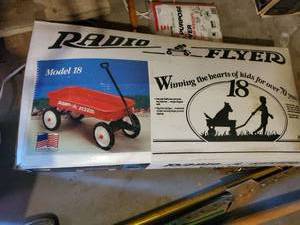 lot 3940 image: MODEL 18 RADIO FLYER. NEVER OPENED