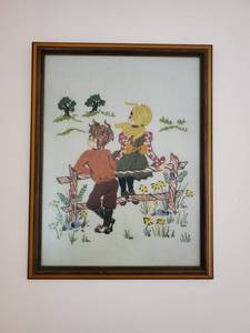 lot 8315 image: Crewel of Boy & Girl Resting on Fence
