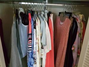lot 9014 image: Closet of Womans Clothes. A Lot with Tags