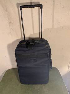 lot 9226 image: Destination Black Rolling Suitcase Location Basement