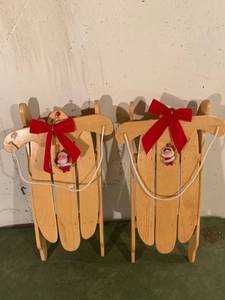 lot 9291 image: Pair of Hanging Sled Decorations Location Basement