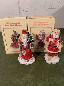 lot 9327 image: Lot of 2 The International Santa Claus Collection Figurines Location Basement