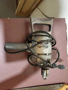 lot 10014 image: Black and Decker 12 Inch Electric Drill.Tested and Working. Trigger Sticks