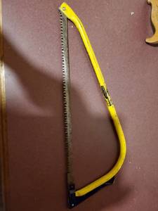 lot 10016 image: Yellow Bushman Saw.