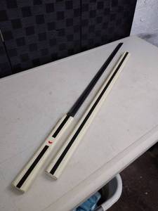 lot 1429 image: black and white wood case sword