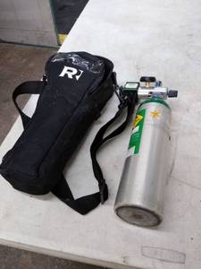 lot 1604 image: oxygen tank with bag