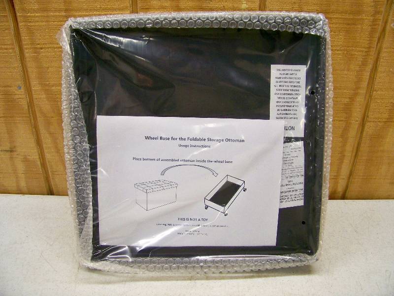 lot 1077 image: Wheel Base for Foldable Storage Ottoman