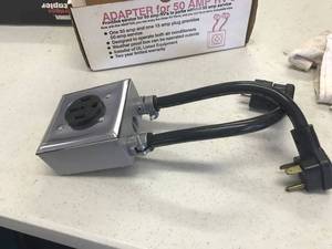 lot 1764 image: RV adapter for 50 Amp service