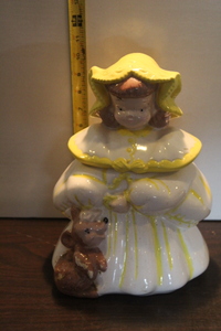 lot 9764 image: Little Girl in Yellow Bonnet