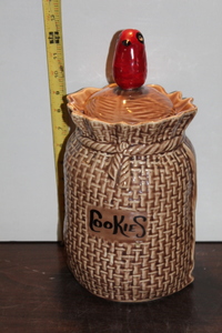 lot 9869 image: USA Sack Cookie Jar with Bird Lid