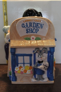 lot 9950 image: Tweety and Sylvester Garden Shop Cookie Jar