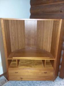 lot 1001 image: Wood Corner Entertainment Center with Rotating TV Shelf and Drawer Storage 46 x 45 x 28 in