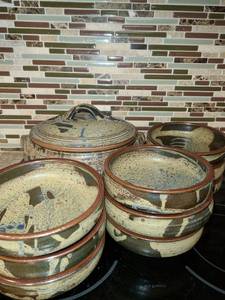lot 1021 image: Pottery. A Large Bowl with Lid and 9 smaller bowls.
