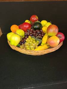 lot 1046 image: A VERY LARGE Basket of Plastic Fruit