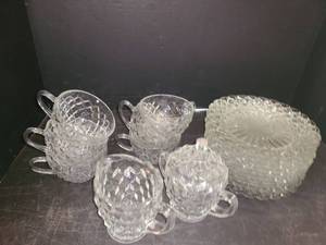 lot 1111 image: 21 Pcs. Fostoria Glass. 12 plates, 6 cups and a sugar and Creamer set