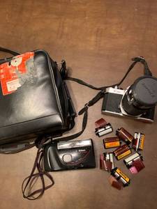 lot 2101 image: Pentax K 1000 camera and a Nikon one touch 100