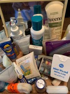 lot 2240 image: Assorted bathroom items lotions toothpaste mouthwash floss