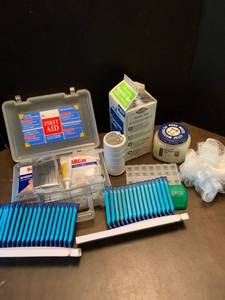 lot 2251 image: First aid kit and razors and various bathroom items