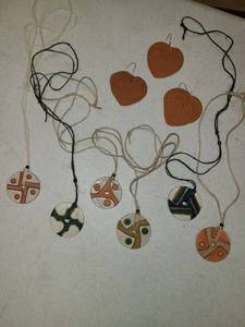 lot 3095 image: 9 pcs. of Pottery. 6 pcs. are Necklaces, and 3 are Ornaments