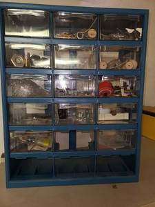 lot 3225 image: Storage Bin. With Contents. Missing 4 drawers