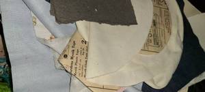 lot 3444 image: Box of Yarn with Hooked Rug Machine and a little fabric scraps